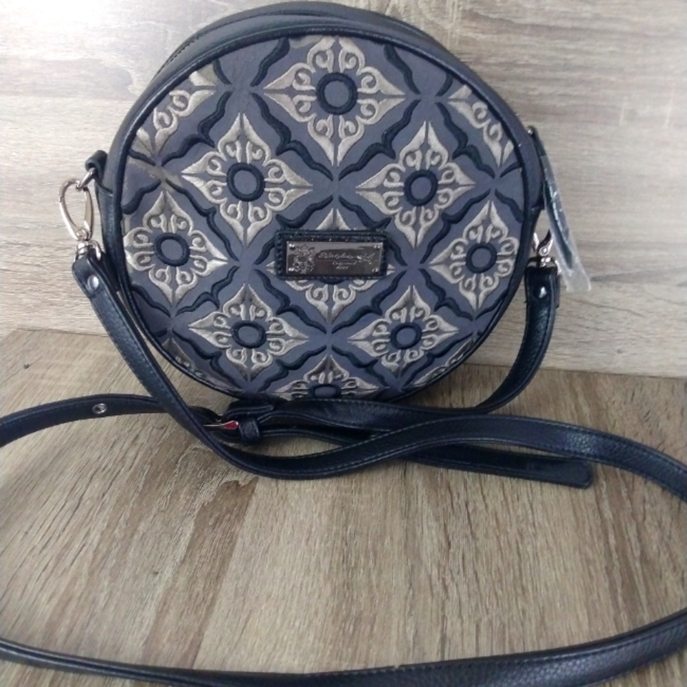 Designed in New York by Sharif Round Purse